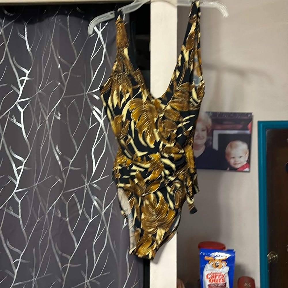 One piece suit, worn, gently, no padding